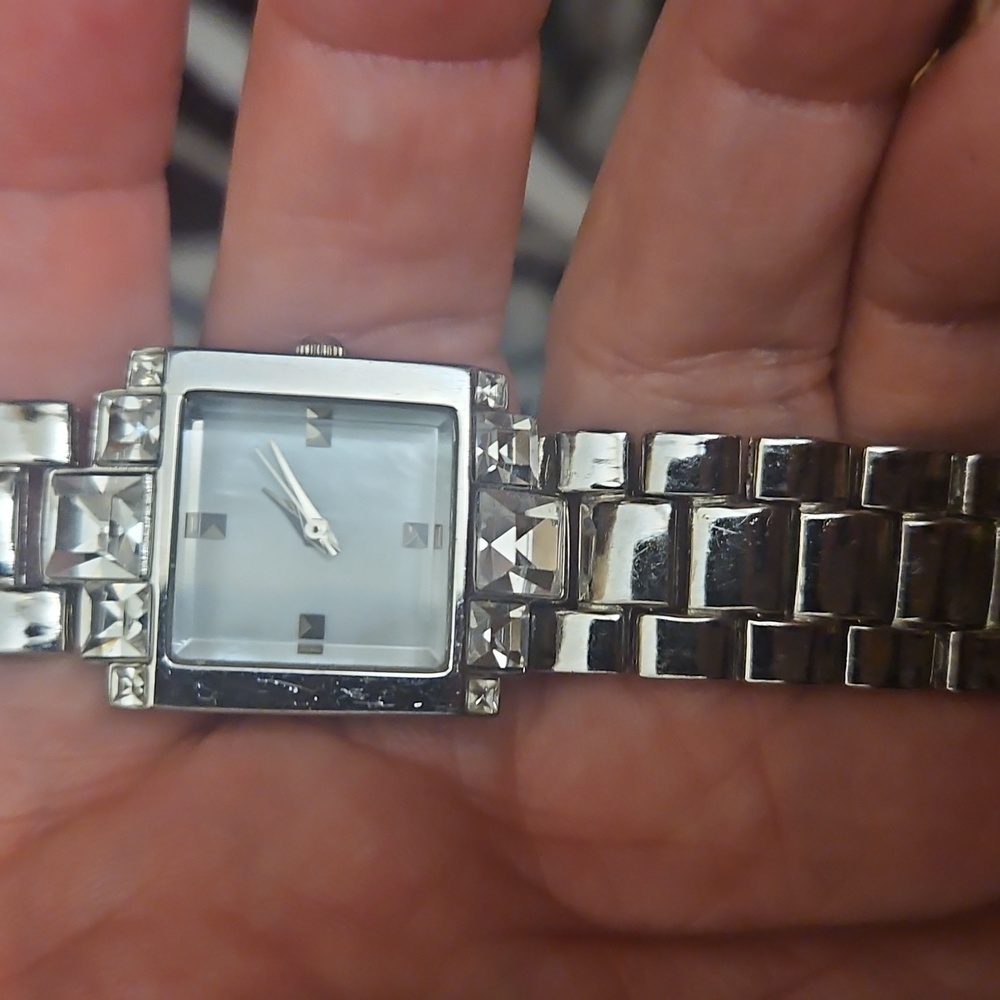 Vintage Women's Silver Tone Square Watch featuring a sleek minimalist